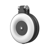 Black round selfie ring light with clip, showing its lit ring