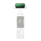 Green-tinted Diffusion 1/4 filter fitted on a white handheld gimbal camera