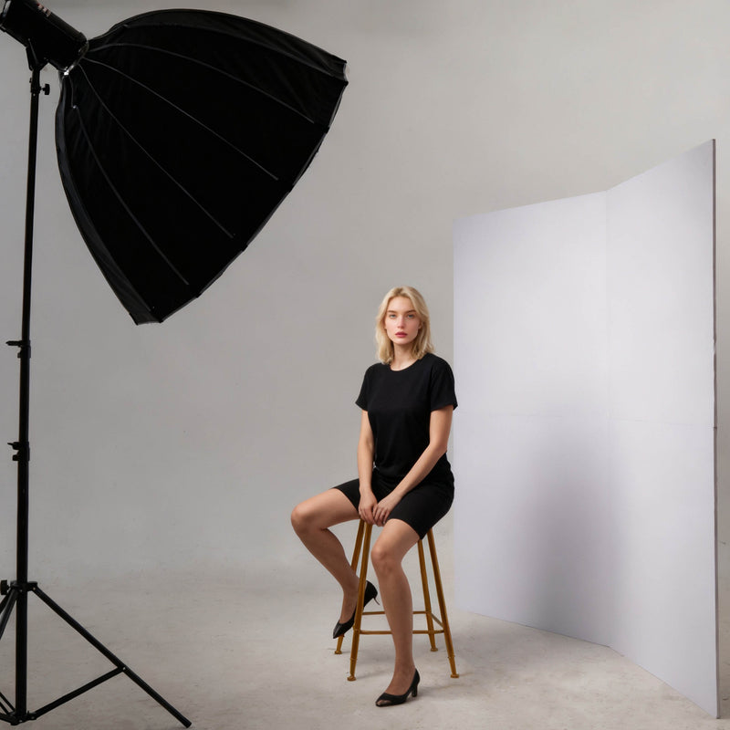 White side of the PIxapro 1x2m Foldable Black/white V-Flat Panel being used to bounce light onto a model
