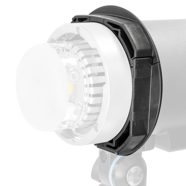 The GODOX AD-AB adapter mounted to the front of an AD300Pro Portable Flash