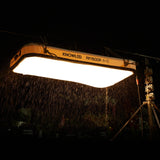 A Godox KNOWLED AM1600R-48K 4'x8' Inflatable RGB LED Light Mat being used in the rain to illustrate Ip54 Weatherproof Rating