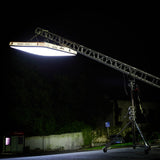 Godox KNOWLED AM1600R-48K 4'x8' Inflatable RGB LED Light Mat suspended from a crane in an outdoor location