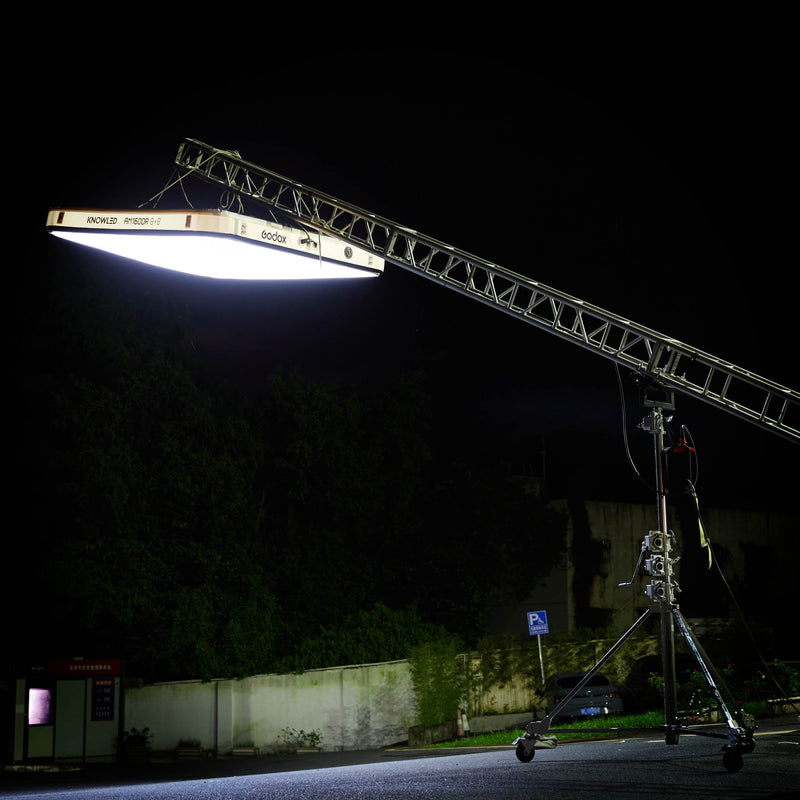 Godox KNOWLED AM1600R-48K 4'x8' Inflatable RGB LED Light Mat suspended from a crane in an outdoor location