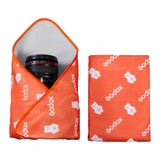  Godox GC01 Magic Wrap  being used to wrap a camera lens