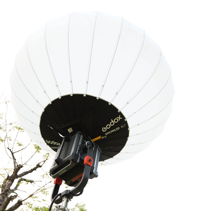 GODOX KNOLED GL7 7-Foot G-Mount Lantern Diffuser mounted to a knowled MG2400R light fixture outdoors
