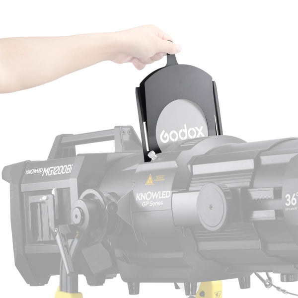 Godox KNOWLED GP-CF Gobo Holder being inserted into a GP-Series G-Mount Projection Attachment with a gobo 