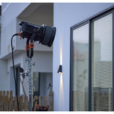 GODOX KNOWLED M600R RGBWW COB LED STUDIO LIGHT BEING USED TO ILLUMINATE A SCENE FROM OUTDOORS