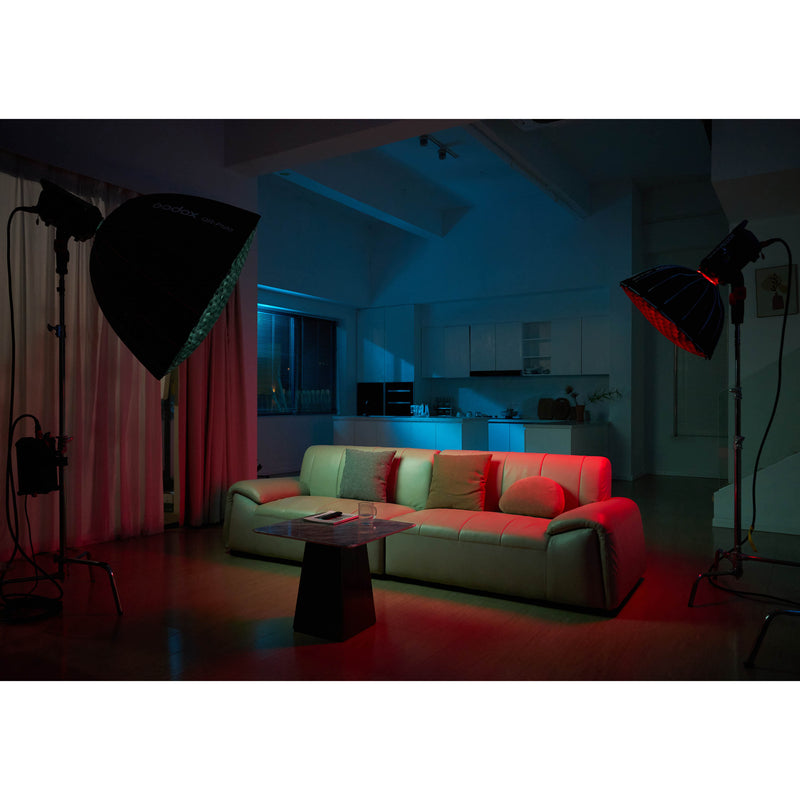 TWO GODOX KNOWLED M600R RGBWW COB LED STUDIO LIGHTS BEING USED TO ILLUMNATE AN INDOOR SCENE
