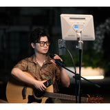 Godox P260C Pro Edge-Lit Bi-Colour LED Panel being used to illuminate a musician