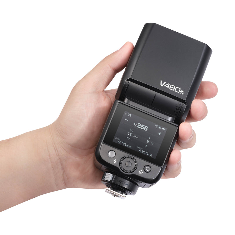 Godox V480 Compact TTL Speedlite being held by a person in the palm of their hand