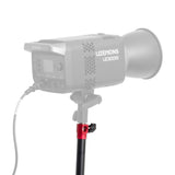 A close up of the PiXAPRO RapidStand 225 Light stand with a COB LED studio light fixture mounted to it