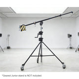 The 216-370 cm Heavy-Duty Geared Junior Boom Crane Arm mounted to a junior geared stand in a large studio environment