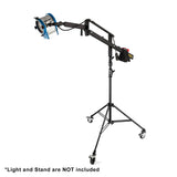 The PiXAPRO Flamingo boom arm mounted to a light stand with a larger Arri Fresnel light mounted to it