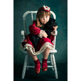Child in a red dress sitting on a white chair holding a black dog in front of a 3x2m Abstract Texture Fine Art Green tones Horizontal Background from Kate Backdrops