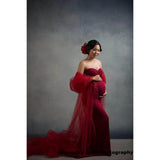 A Woman in a red dress holding her pregnant belly against a 2x3 Abstract Cold Tones Of Grey Textured Studio Photography Background from Kate Backdrops