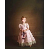 A Young girl in front of a Abstract Fashion Brown Spotlight Backdrop 