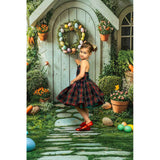 A young girl ina tartan, standing in front of an Easter House Bunny Garden Carrots Backdrop