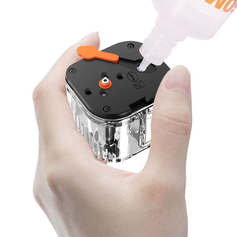 LensGo Smoke Go Compact Portable Fog Machine's tank being filled
