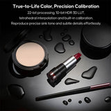 Makeup products including a compact powder, lipstick, and brush on a dark surface with text about color calibration.