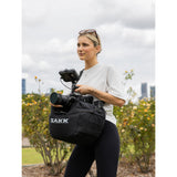 SAKK GEAR Camera Saddle Photographer on location using case to hold camera