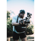 SAKK GEAR Camera Saddle Photographer using case to hold camera on location