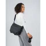 SAKK GEAR Laptop Camera Sling Photographer posing with bag over their shoulder