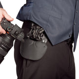 SpiderPro Camera Holster v3 with Suspension Clip & Pad Attached to Belt of Photographer