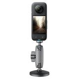 360 camera attached vertically to a Telesin magnetic dual ball-head mount
