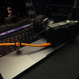TetherPro Optima 10G USB-C 3.2 High-Visibility Orange Cable (3m Straight to Straight) Plugged into Camera