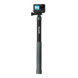 Retracted Telesin selfie stick with an action camera attached.