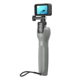 Rear view of TELESIN selfie stick with GoPro mounted and wrist strap attached.