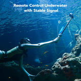Snorkeller holding an extended TELESIN selfie stick underwater with a GoPro mounted.