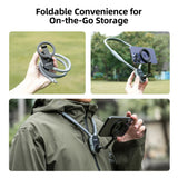 TELESIN neck mount folded for storage, extended with a phone attached and worn outdoors.