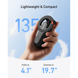 Folded Telesin selfie stick held in one hand, weighing 135g and extending from 4.1 to 19.7 inches