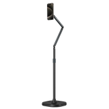 TELESIN magnetic floor phone stand with articulated arm holding a smartphone vertically