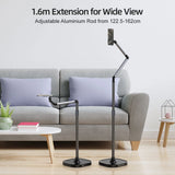 TELESIN floor phone stand shown at low and extended heights beside a sofa