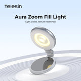 Telesin Aura Zoom Fill Light illuminated and tilted above its circular base.