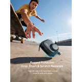 TELESIN mini camera case shown falling towards concrete beside a skateboarder, illustrating impact protection